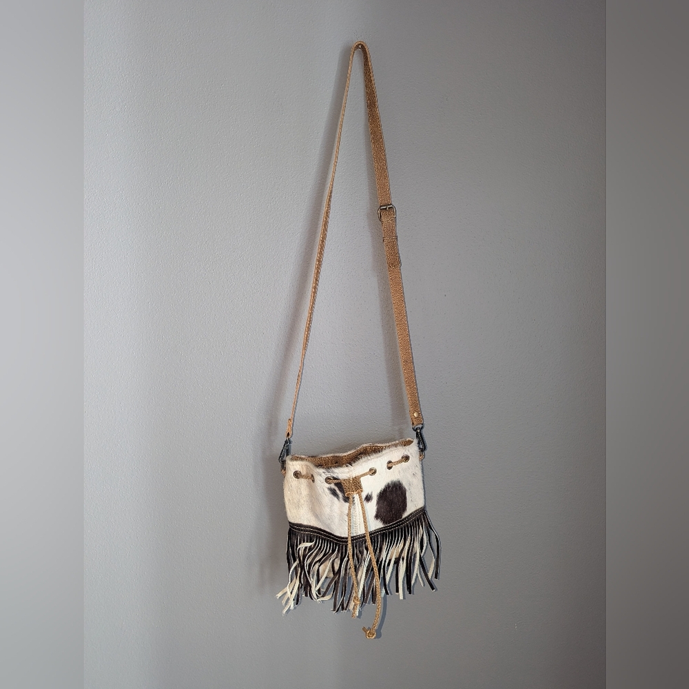 Myra Cow Print Pattern With Leather Detail And Fringe. 9x8x3